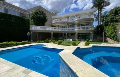 Imagem: A casa em condomínio possui 4 Dormitórios, 5 Banheiros, 5