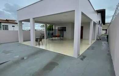 Imagem: A casa possui 2 Dormitórios, 2 Banheiros, 3 Vagas na garagem