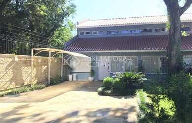 Imagem: A casa em condomínio possui 3 Dormitórios, 1 Banheiro, 3 Vagas