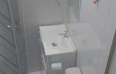 Imagem: A casa possui 3 Dormitórios, 2 Banheiros, 1 Vaga na garagem