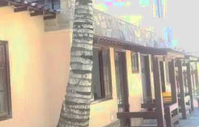 Imagem: A casa em condomínio para alugar possui 1 Dormitório, 2 Banheiros