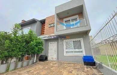 Imagem 2: Casa em Porto Alegre, no bairro Hípica, com 3 dormitório s , e 3 banheiros,...