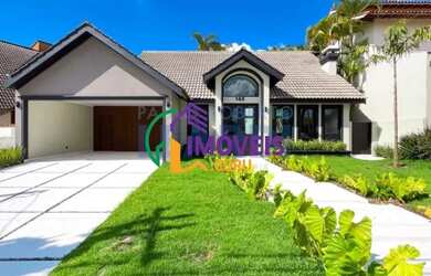 Imagem: A casa em condomínio possui 5 Dormitórios, 5 Banheiros, 5