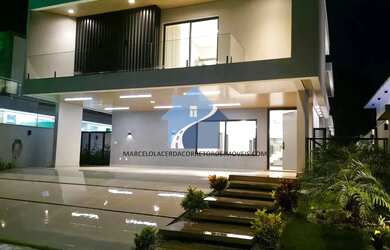 Imagem: A casa possui 5 Dormitórios, 5 Banheiros, 5 Vagas na garagem