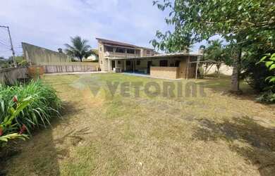 Imagem: A casa possui 3 Dormitórios, 3 Banheiros, 5 Vagas na garagem