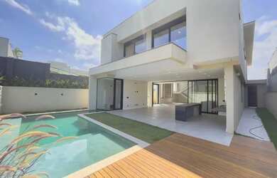 Imagem: A casa em condomínio possui 4 Dormitórios, 5 Banheiros, 5