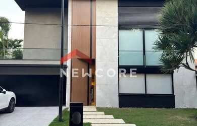 Imagem: A casa em condomínio possui 4 Dormitórios, 5 Banheiros, 4