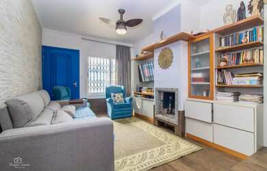 Imagem: A casa possui 3 Dormitórios, 3 Banheiros, 3 Vagas na garagem