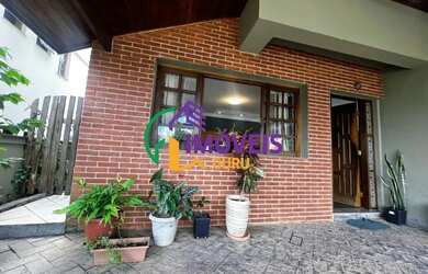 Imagem: A casa em condomínio possui 4 Dormitórios, 5 Banheiros, 2