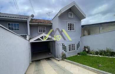 Imagem: A casa possui 3 Dormitórios, 2 Banheiros, 2 Vagas na garagem