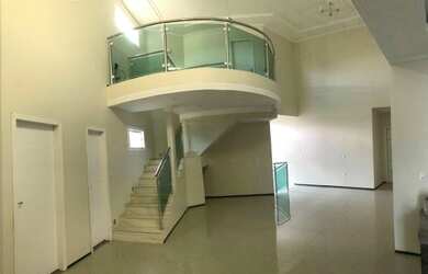 Imagem: A casa possui 4 Dormitórios, 5 Banheiros, 5 Vagas na garagem