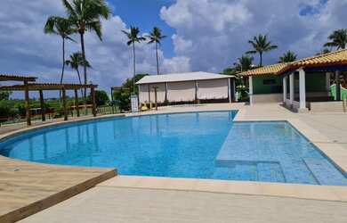 Imagem: A casa possui 2 Dormitórios, 2 Banheiros, 2 Vagas na garagem