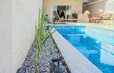 Imagem: A casa em condomínio possui 5 Dormitórios, 5 Banheiros, 3