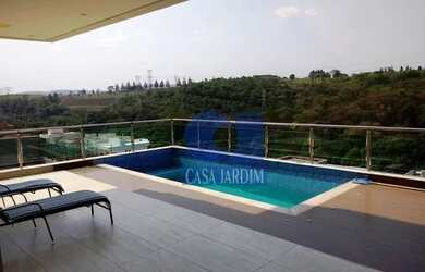 Imagem: A casa em condomínio possui 5 Dormitórios, 5 Banheiros, 2