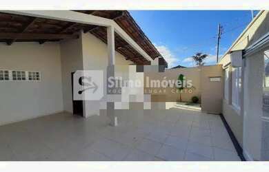 Imagem: A casa possui 3 Dormitórios, 3 Banheiros, 4 Vagas na garagem