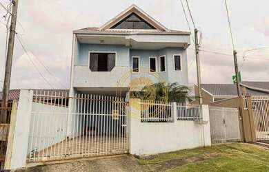 Imagem: A casa e possui 3 Dormitórios, Suítes, 3 Banheiros, 2 Vagas