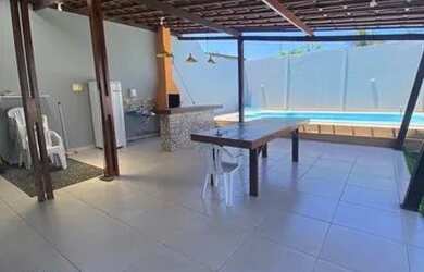 Imagem: A casa possui 3 Dormitórios, 3 Banheiros, 5 Vagas na garagem