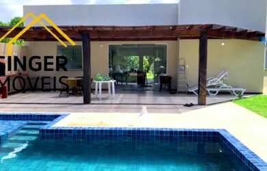 Imagem: A casa em condomínio possui 4 Dormitórios, 4 Banheiros, 4