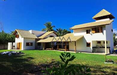 Imagem: A casa possui 5 Dormitórios, 4 Banheiros, 2 Vagas na garagem