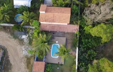 Imagem: A casa em condomínio possui 2 Dormitórios, 2 Banheiros e 450m²