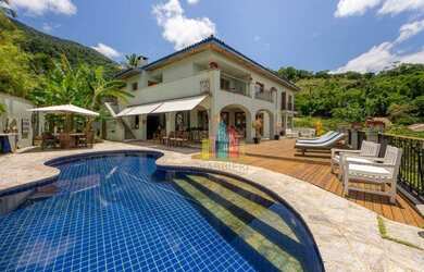 Imagem: A casa possui 5 Dormitórios, 5 Banheiros, 5 Vagas na garagem