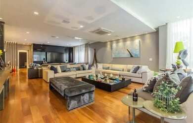 Imagem: A casa possui 4 Dormitórios, 5 Banheiros, 5 Vagas na garagem