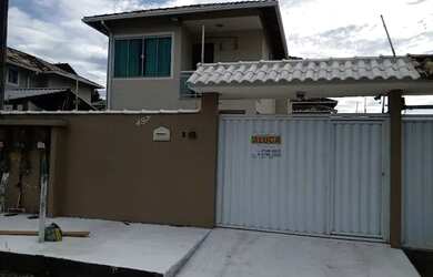 Imagem: A casa possui 3 Dormitórios, 2 Banheiros, 3 Vagas na garagem