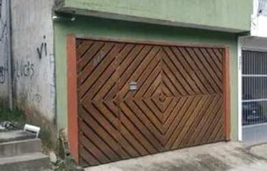 Imagem: A casa possui 3 Dormitórios, 3 Banheiros, 2 Vagas na garagem