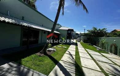 Imagem: A casa possui 3 Dormitórios, 4 Banheiros, 3 Vagas na garagem