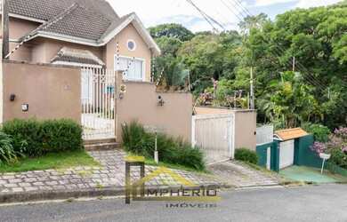 Imagem: A casa possui 3 Dormitórios, 5 Banheiros, 5 Vagas na garagem