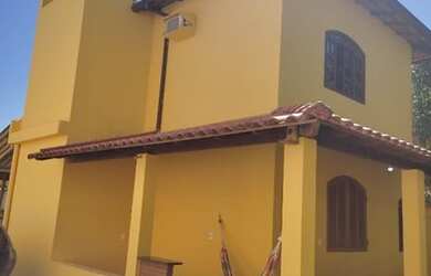 Imagem: A casa possui 4 Dormitórios e 3 Vagas na garagem e está localizado