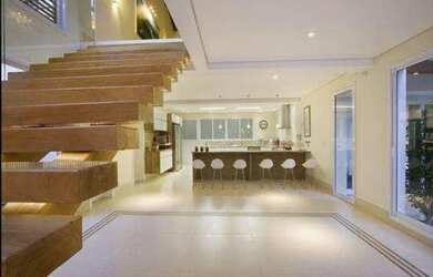 Imagem: A casa possui 3 Dormitórios, 3 Banheiros, 2 Vagas na garagem