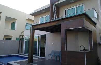 Imagem: A casa possui 3 Dormitórios, 4 Banheiros, 4 Vagas na garagem