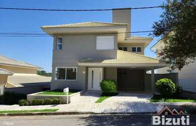 Imagem: A casa em condomínio possui 4 Dormitórios, 5 Banheiros, 4