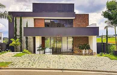 Imagem: A casa possui 5 Dormitórios, 5 Banheiros, 3 Vagas na garagem