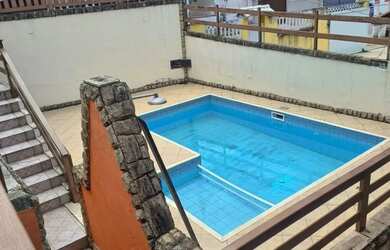 Imagem: A casa possui 5 Dormitórios, 5 Banheiros, 5 Vagas na garagem