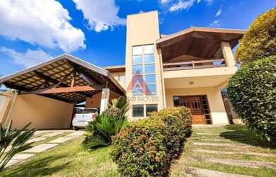 Imagem: A casa em condomínio possui 5 Dormitórios, 5 Banheiros, 4