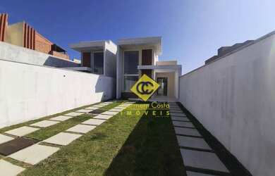 Imagem: A casa possui 3 Dormitórios, 2 Banheiros, 2 Vagas na garagem