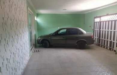 Imagem: A casa possui 2 Dormitórios e 2 Banheiros e está localizado