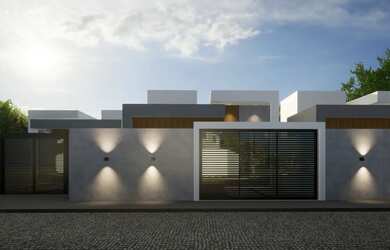 Imagem: A casa possui 3 Dormitórios, 2 Banheiros, 2 Vagas na garagem