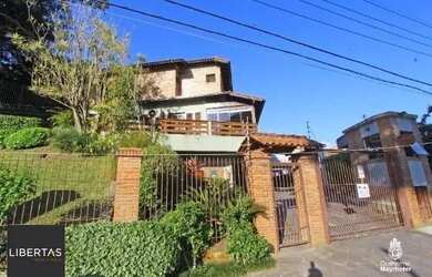 Imagem: A casa em condomínio possui 3 Dormitórios, 3 Banheiros, 2