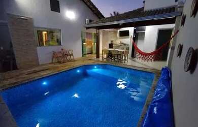 Imagem: A casa possui 3 Dormitórios, 3 Banheiros, 2 Vagas na garagem