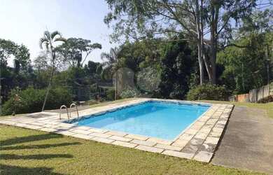 Imagem: A casa possui 5 Dormitórios, 5 Banheiros, 5 Vagas na garagem