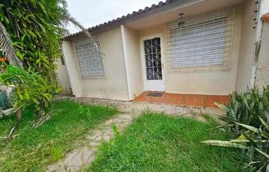 Imagem: A casa à venda possui 3 Dormitórios, 2 Banheiros, 3 Vagas