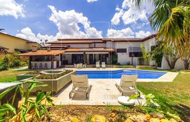 Imagem: A casa possui 5 Dormitórios, 5 Banheiros, 3 Vagas na garagem