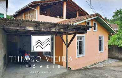 Imagem: A casa possui 3 Dormitórios, 1 Banheiro, 1 Vaga na garagem