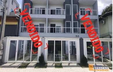 Imagem: A casa possui 2 Dormitórios, 3 Banheiros, 1 Vaga na garagem