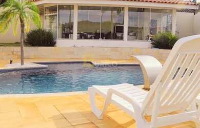 Imagem: A casa possui 3 Dormitórios, 4 Banheiros, 4 Vagas na garagem