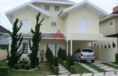 Imagem: A casa em condomínio possui 4 Dormitórios, 3 Banheiros, 4