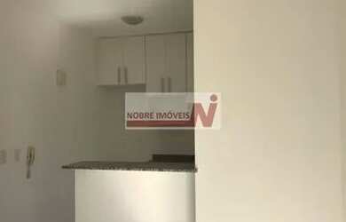 Imagem: O apartamento possui 2 Dormitórios, 1 Banheiro, 1 Vaga na garagem